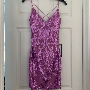 Lavender Sequin Homecoming dress. New with tags and never worn.